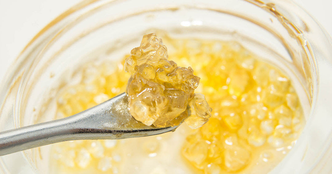 SoKO Concentrate Diamonds Being Scooped By Spoon in Glass Jar