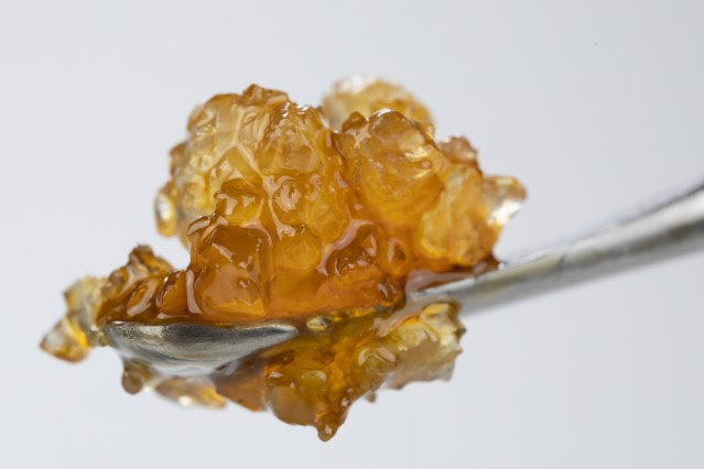 Soko Cannabis Sauce Picked Up On a Spoon